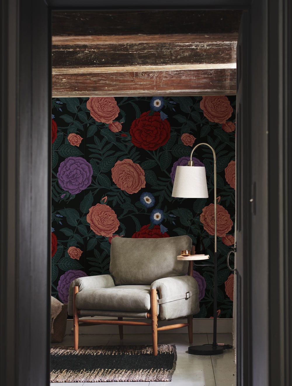 Wallpaper mural with a dark and colorful bouquet of blossoms for the hallway's decor.