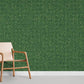 Mural room covered with dark green mosaic wallpaper.