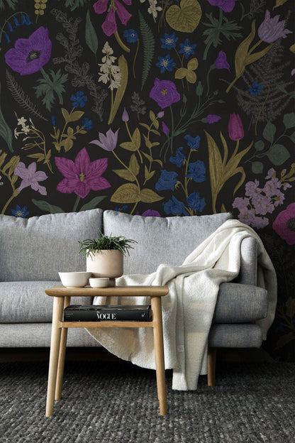 Wallpaper mural with dark purple flowers designed for use as living room decor