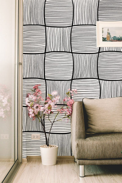 Modern Geometric Black White Dazzle Squares Wallpaper in living room
