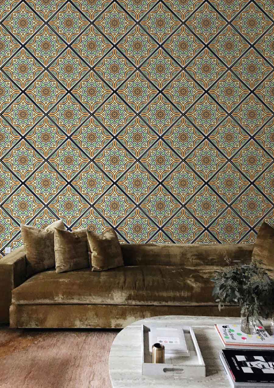 A dark green and orange repetition pattern creates a striking wallpaper mural for the living area.