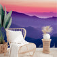 Wallpaper mural with an ethereal dreamscape of purple mountains for the hallway's decor.