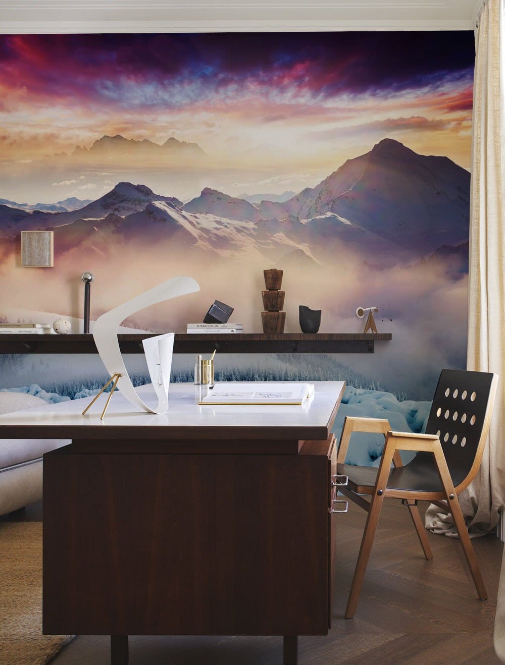 Wallpaper mural depicting a sunset over a mountain in the evening after snowfall.