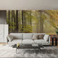 A wall mural of a forest in the fall is a great way to decorate a living room