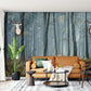 A sunny day in the forest is shown on a wall mural for the living room