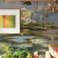 wallpaper mural featuring a vintage flower on a marsh scene for use in decorating a living room