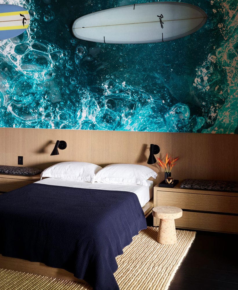Wallpaper mural with a fluorescent ocean hole design for use as bedroom decor.