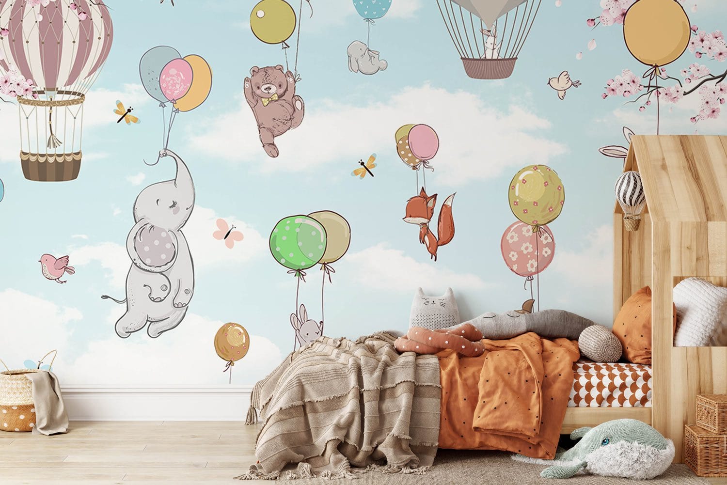 Decorate your nursery with this adorable Animals' Sky Trip Wallpaper Mural.