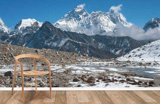 Home decoration wallpaper mural featuring the foot of a snowy mountain.