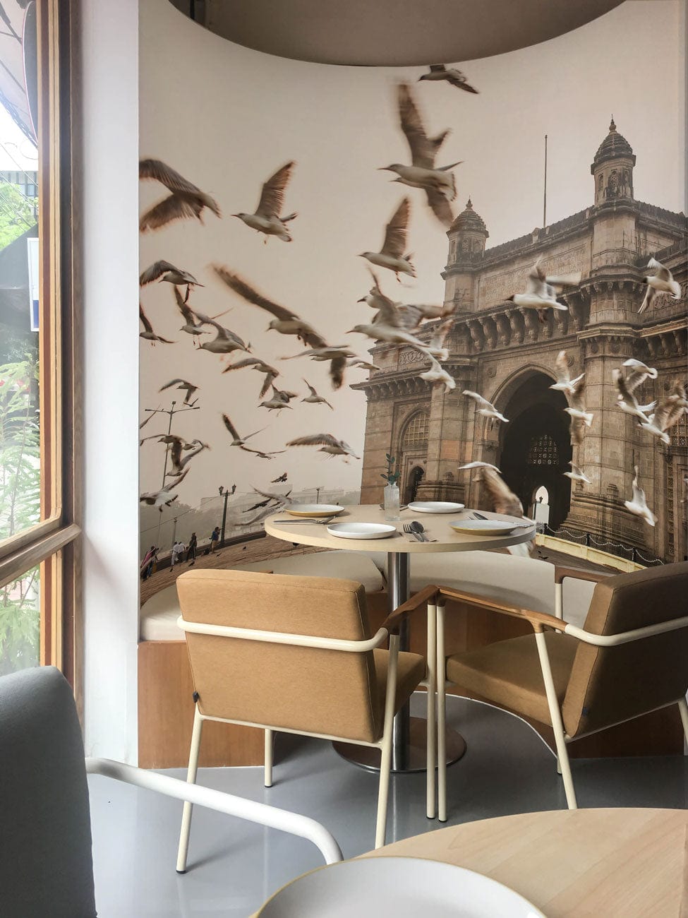 Wallpaper mural featuring a scene from the Gateway of India, perfect for use in the dining room