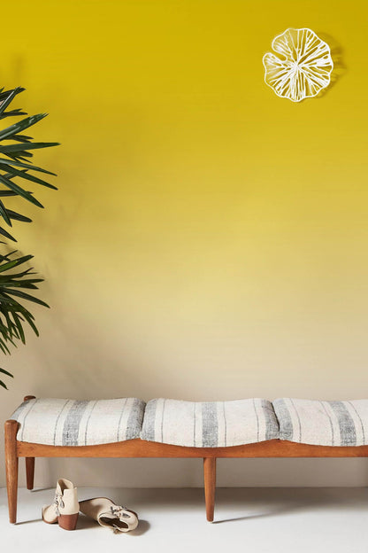 Wallpaper mural with a yellow gradient for use as decoration in the hallway