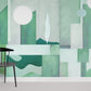 Wallpaper mural with a green geometric pattern for use as home decor