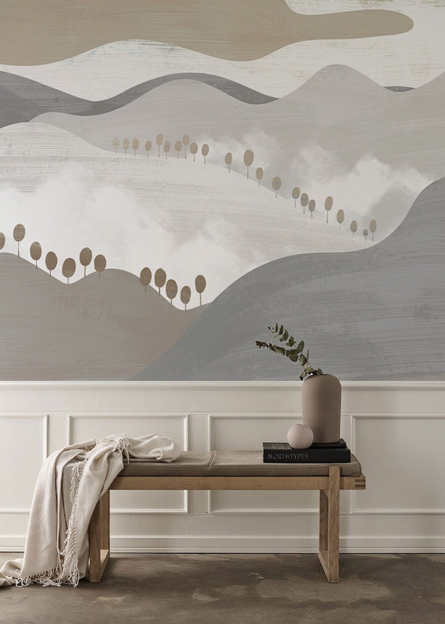 The hallway will be decorated with a wallpaper mural that features a panorama of grey mountains and waves.