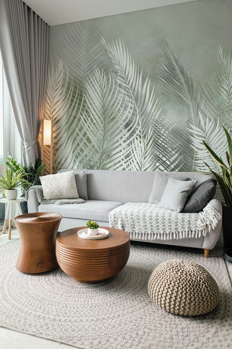 Mural wallpaper design featuring feathers and leaves in green for use as living room decor.