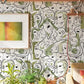 Green Side Faces Wallpaper Mural for Use as Décor in the Hallway