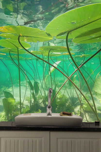 Wallpaper mural with a green underwater world for use in decorating the bathroom.