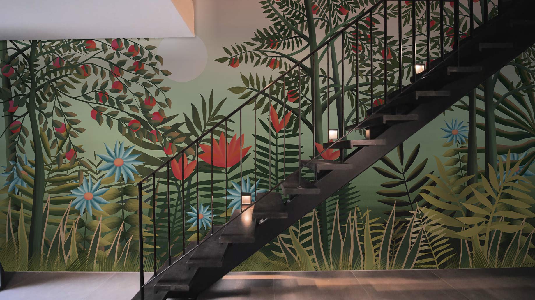 Hallway adornment with a jungle fruit wallpaper mural.