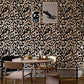 Leopard-print wallpaper mural used for decorating the inside of the dining room.