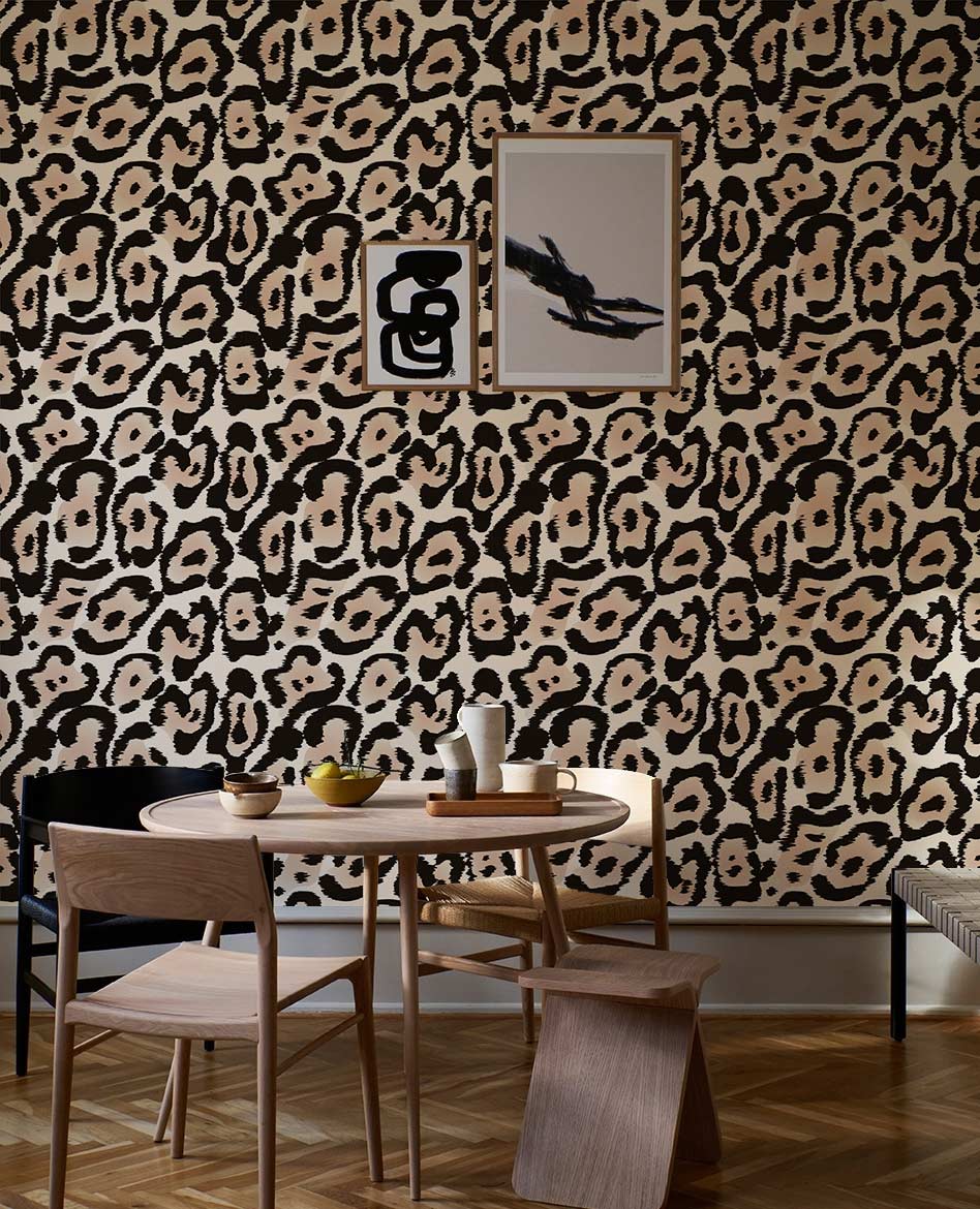 Leopard-print wallpaper mural used for decorating the inside of the dining room.