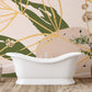 Wallpaper mural for the bathroom with a golden linier and ivy leaves.