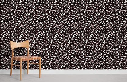 Wallpaper mural with a dark terrazzo pattern for use in interior decoration