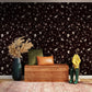 Wallpaper mural with a terrazzo and marble pattern in dark brown for the hallway's decor