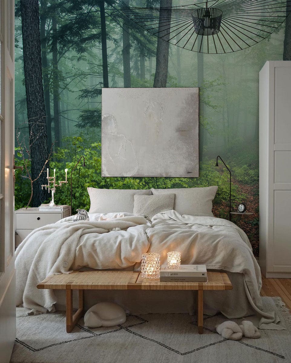 Bedroom decoration with wallpaper mural of a misty forest
