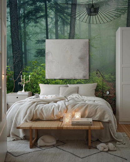 Bedroom decoration with wallpaper mural of a misty forest