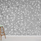 Wallpaper mural with a terrazzo and concrete effect in grey for home decoration