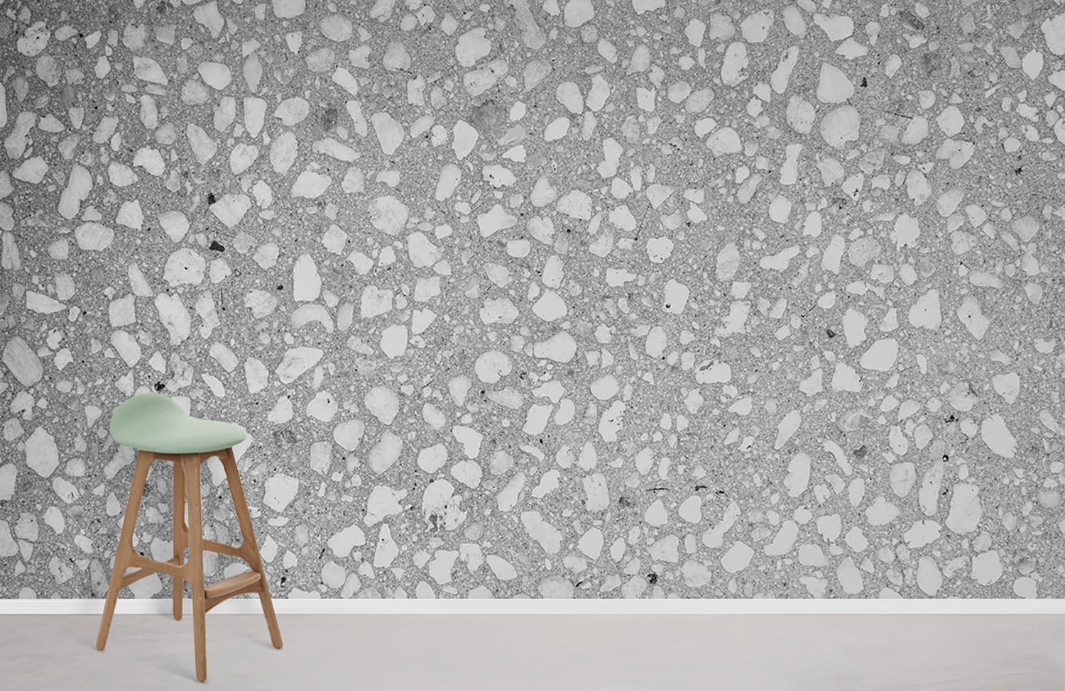 Wallpaper mural with a terrazzo and concrete effect in grey for home decoration