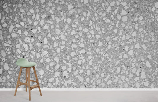 Wallpaper mural with a terrazzo and concrete effect in grey for home decoration