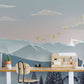 Wallpaper mural with an ombre mountain scene for use in interior design of an office