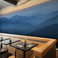 Wallpaper mural with mountains that are cut off from the sky, landscapes, for use in decorating the dining space.