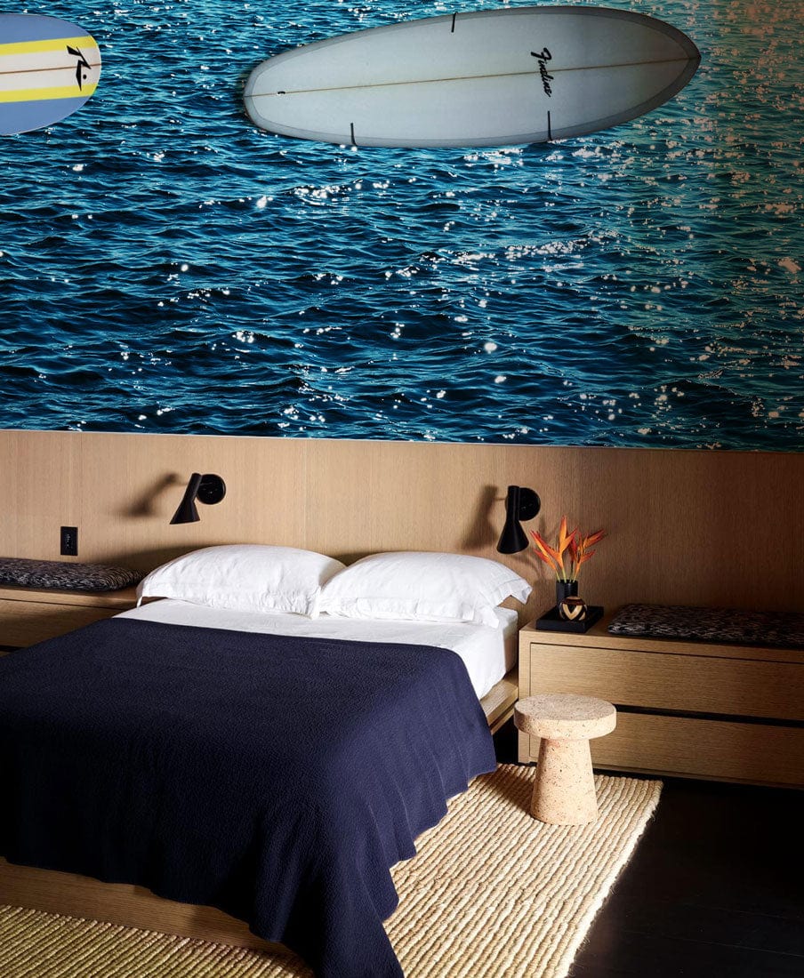 Wallpaper mural featuring an ocean scene with sunshine for use in decorating a 