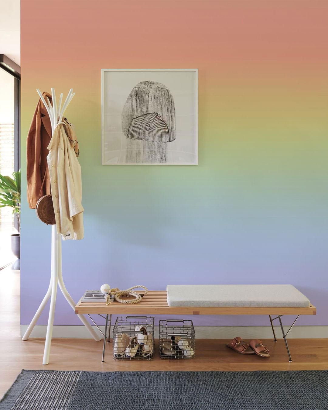 Wallpaper mural with an ombre cream rainbow design, ideal for use in the hallway.