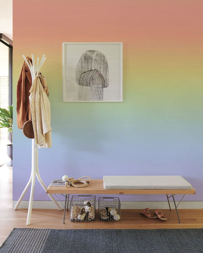 Wallpaper mural with an ombre cream rainbow design, ideal for use in the hallway.
