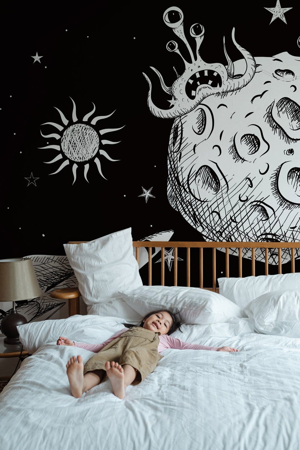 Wallpaper mural depicting outer space for the bedroom