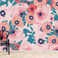 Wallpaper mural with pink flowers designed for use in decorating the powder room.