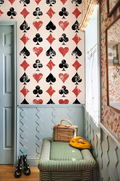 wallpaper with a red and black striped design in the hallway