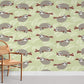 Charming Sloth Green Nursery Mural Wallpaper in bedroom