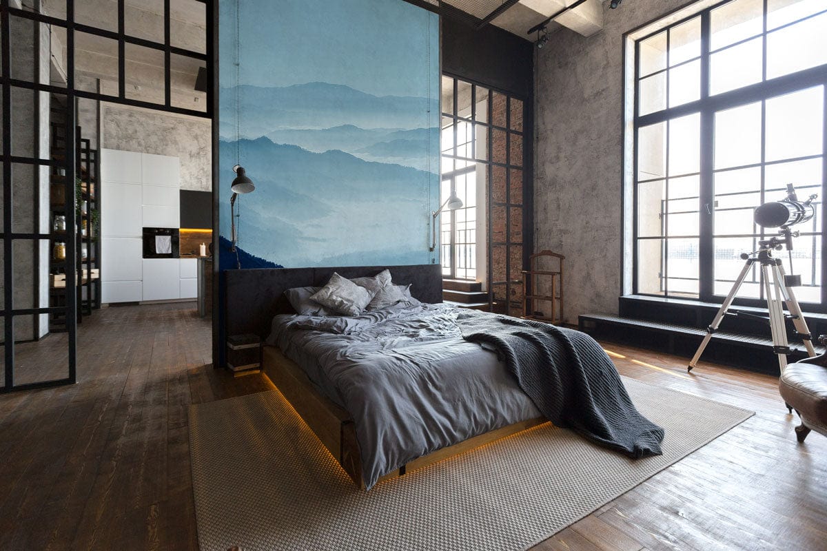 Wallpaper mural featuring rolling misty mountains for use as bedroom decor.
