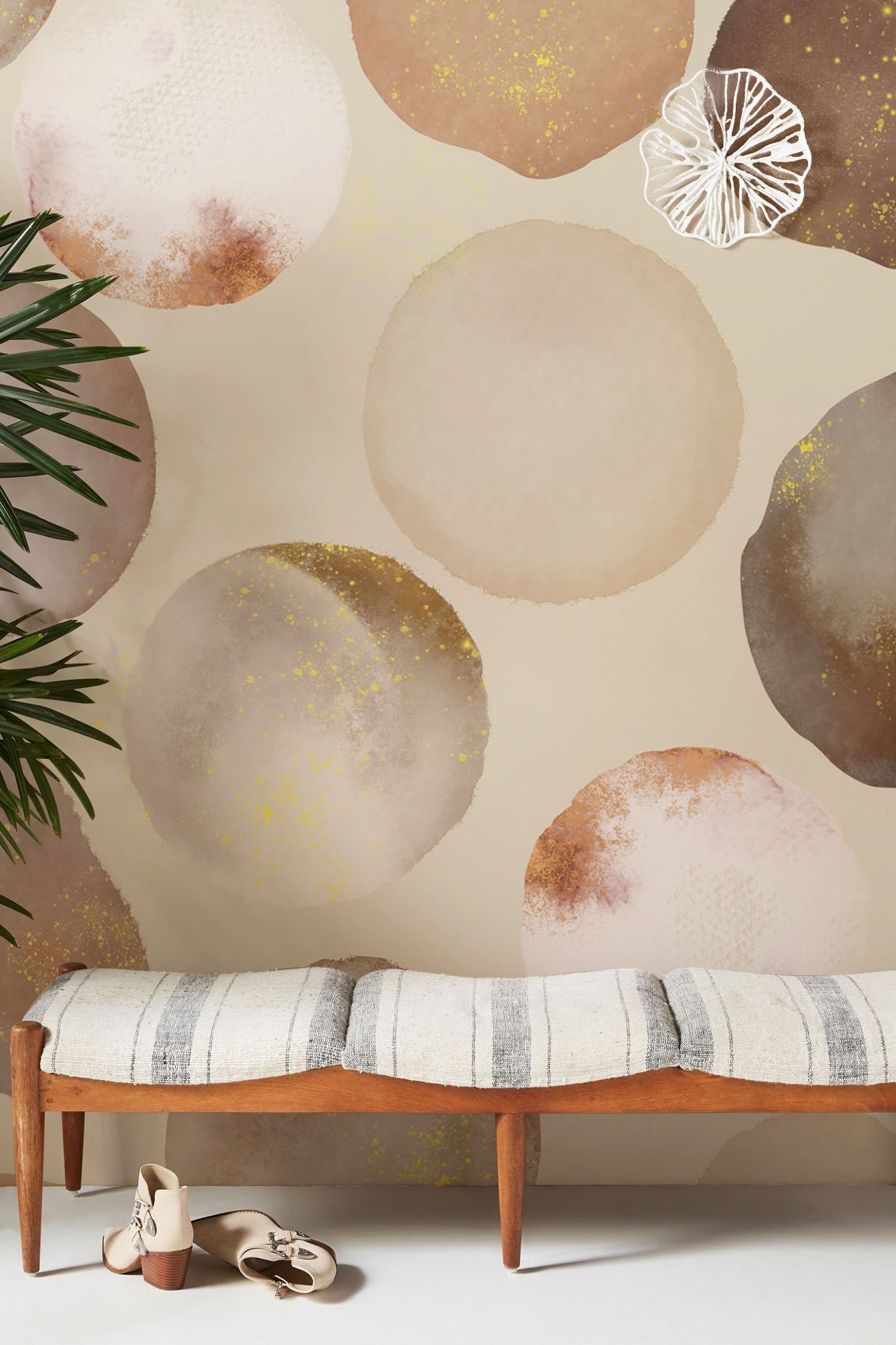 Living room wallpaper mural featuring brown circles on an abstract background