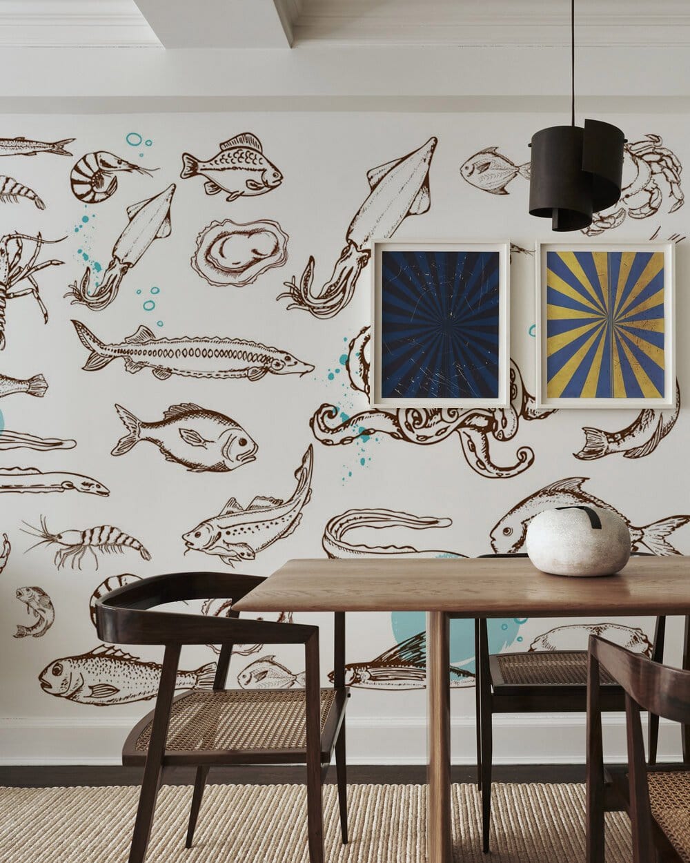 Wallpaper mural with sea fish for the dining room's decor.