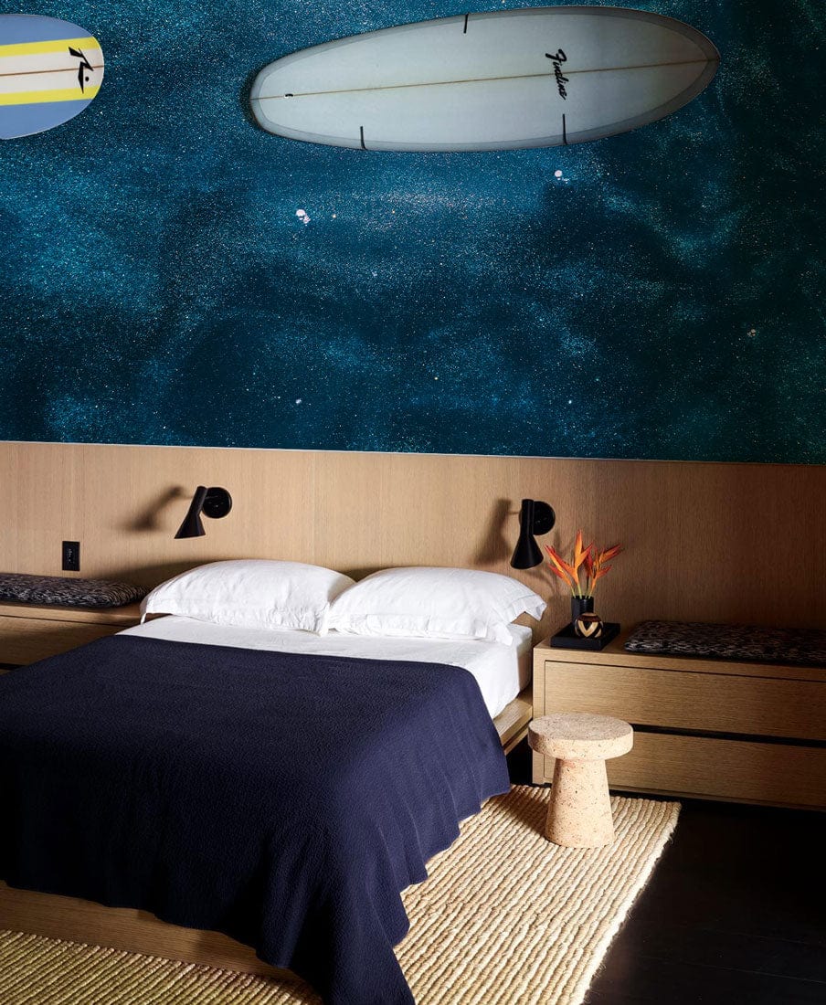 Wallpaper mural featuring a shining dark ocean for use in decorating a bedroom