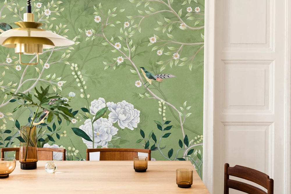 murals of fresh flowers and birds on a bright green background for the dining room's walls