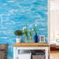 Wallpaper mural with sky blue waves for use as decoration in the hallway