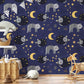 Lounge cats affixed on a moon wallpaper mural.