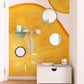Wallpaper mural with a sliced persimmon design for the hallway's decor.