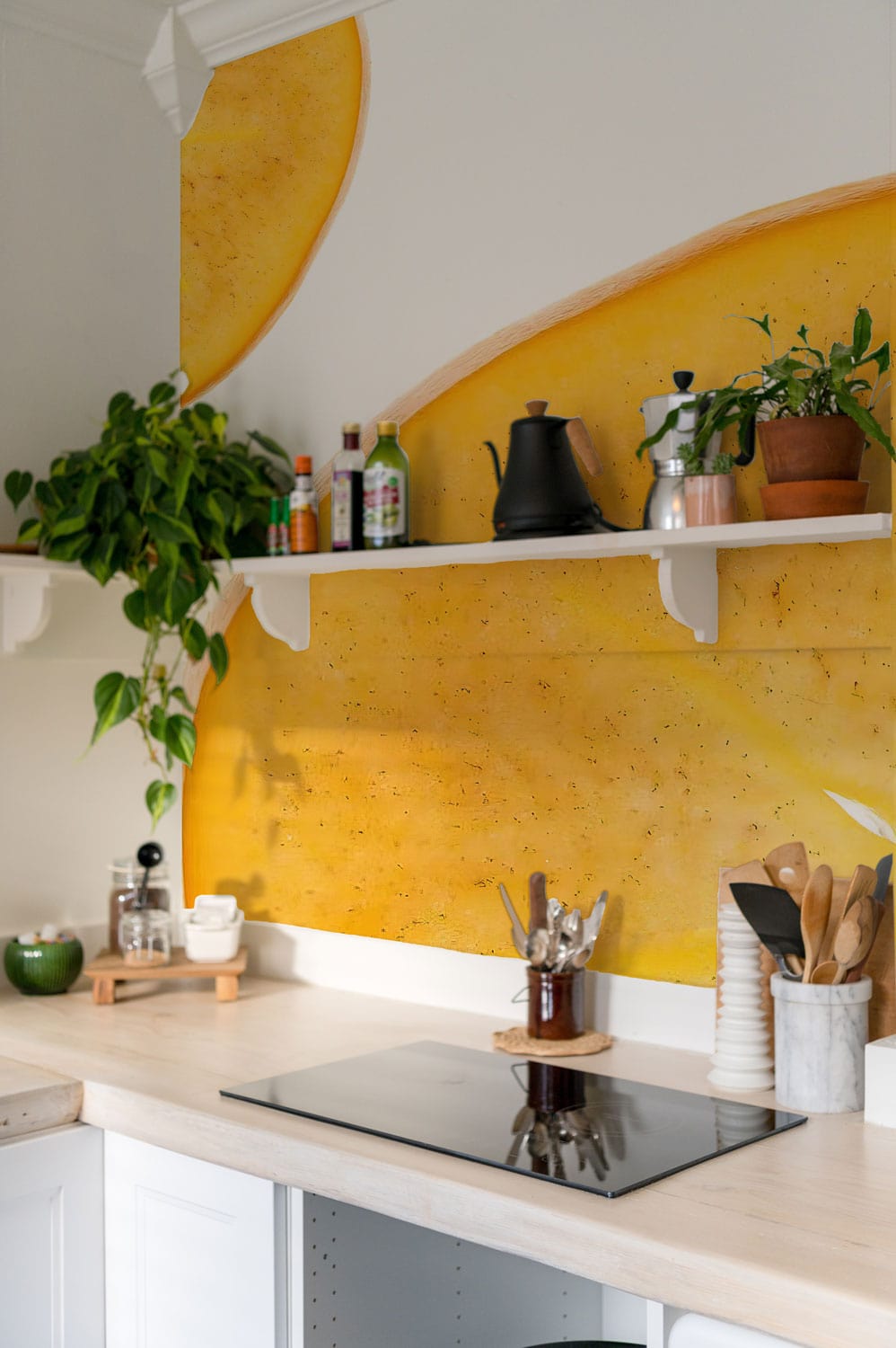 Wallpaper mural featuring a sliced persimmon design for use in the kitchen