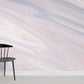 Wallpaper mural with a soft pink marble pattern, perfect for decorating your home.